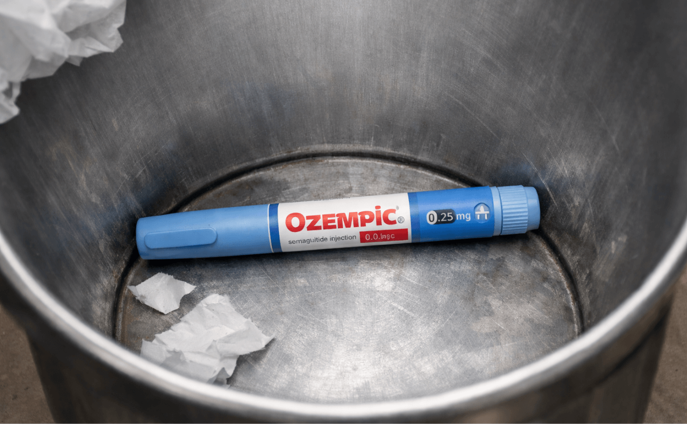 ozempic pen in trash can