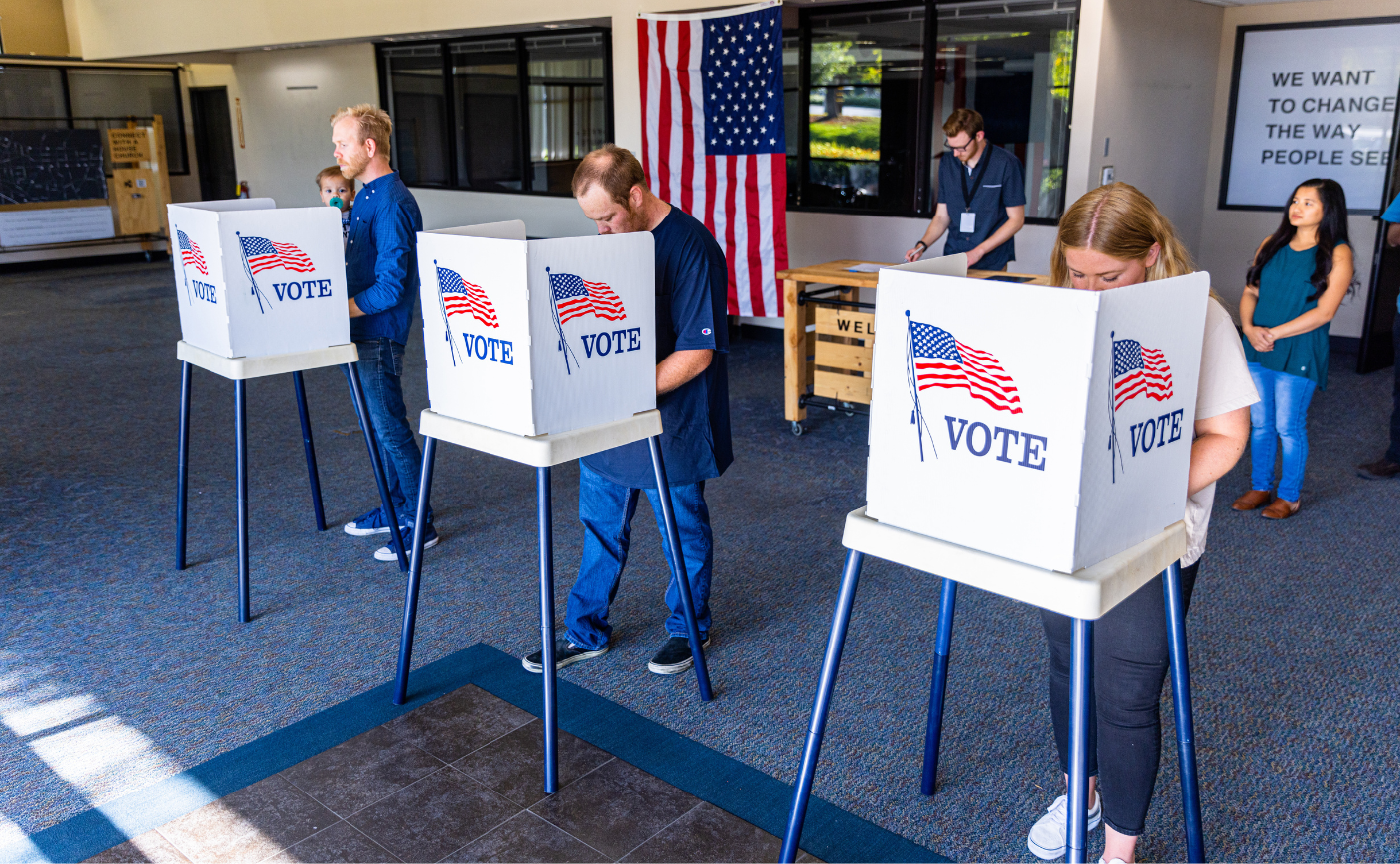 People at voting booths