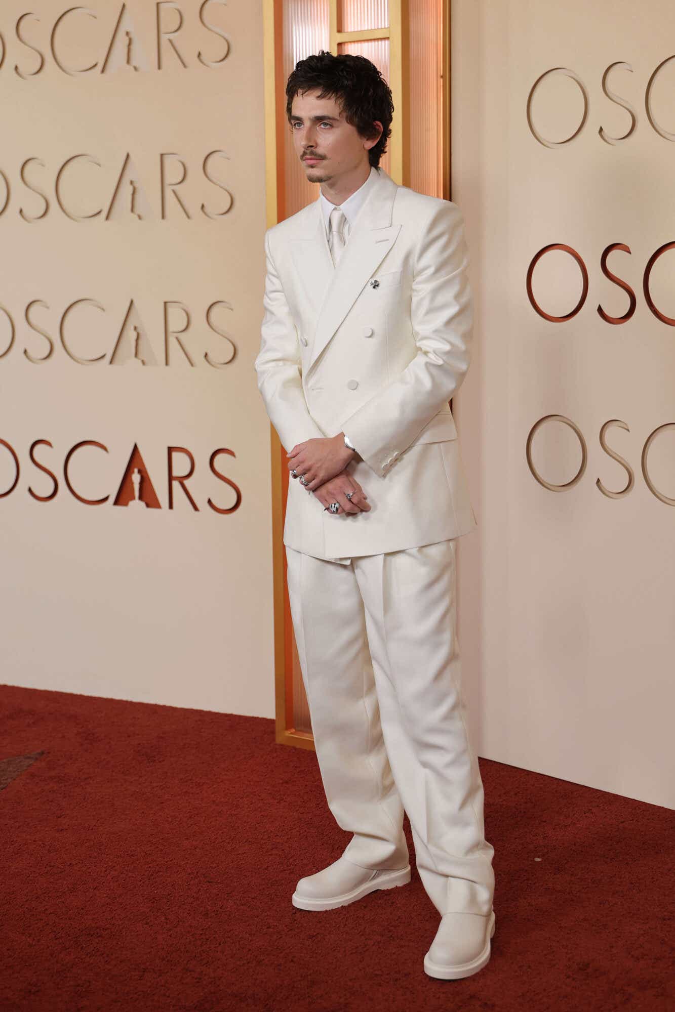 Timothee Chalamet wears a white tux