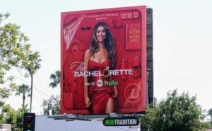 a billboard showing taylor frankie paul as the new bachelorette