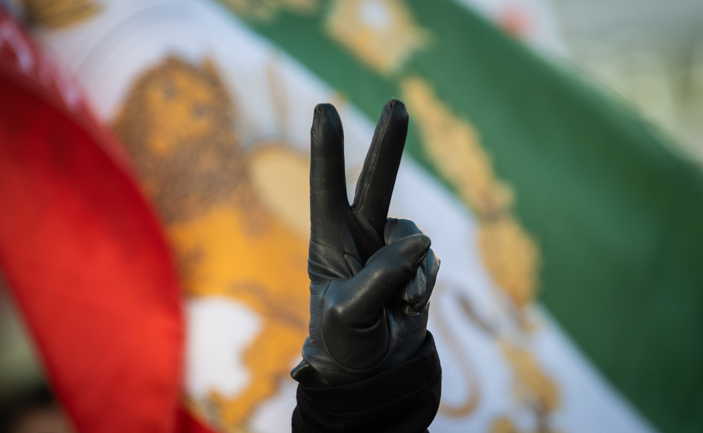 iran flag with peace sign hand