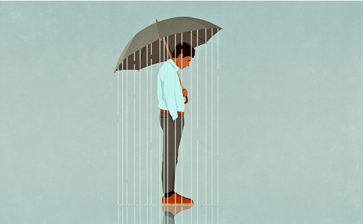 man standing in the rain