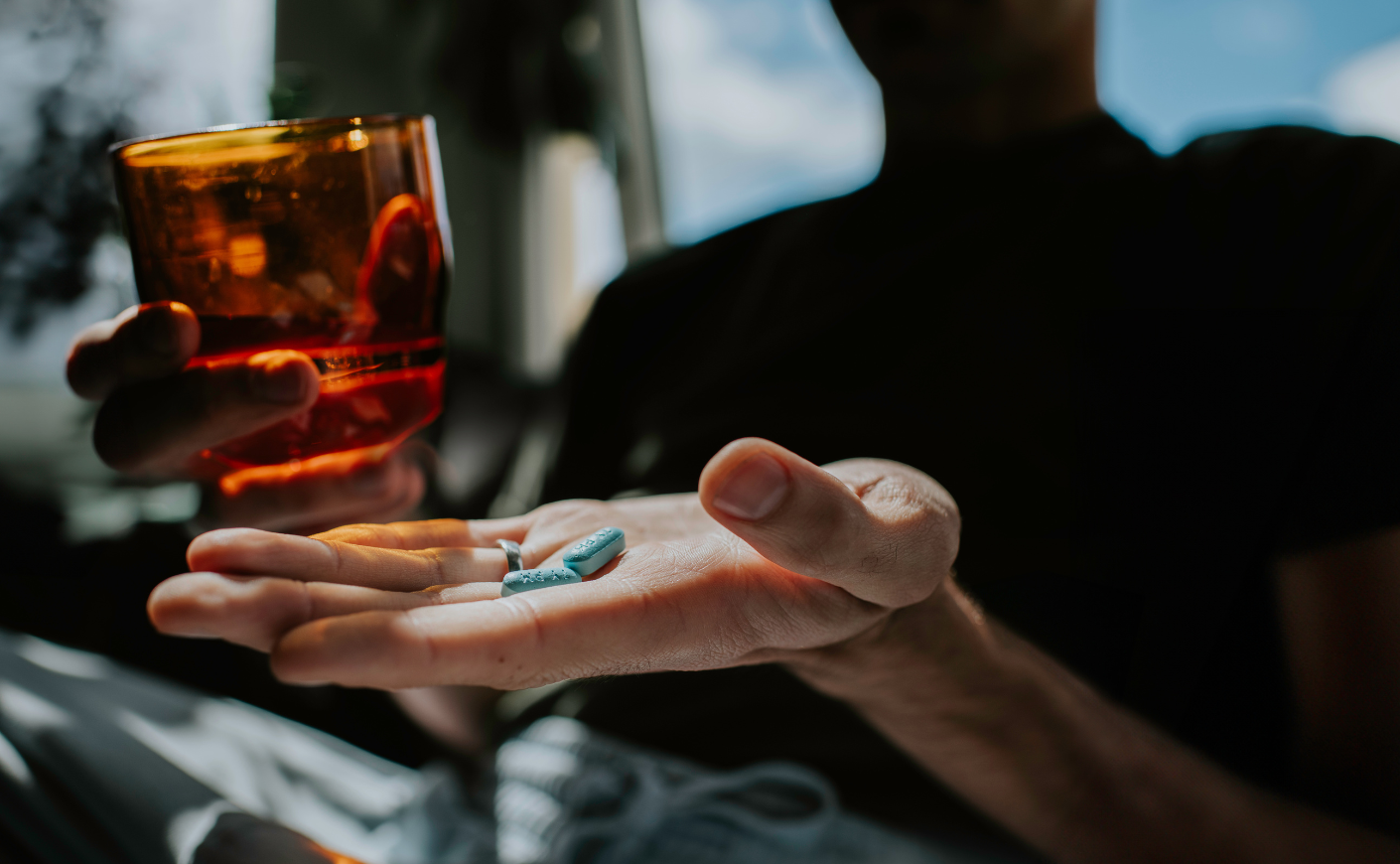man holding pills