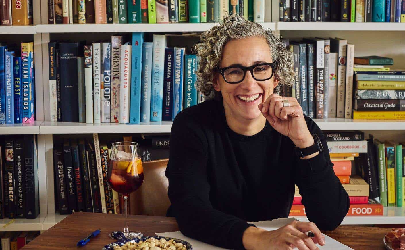Chef Hillary Sterling sitting at a desk.