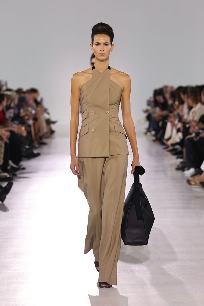 MILAN, ITALY - SEPTEMBER 25: A model walks the runway at the Max Mara fashion show during the Milan Womenswear Spring/Summer 2026 on September 25, 2025 in Milan, Italy. (Photo by Pietro D'Aprano/Getty Images)
