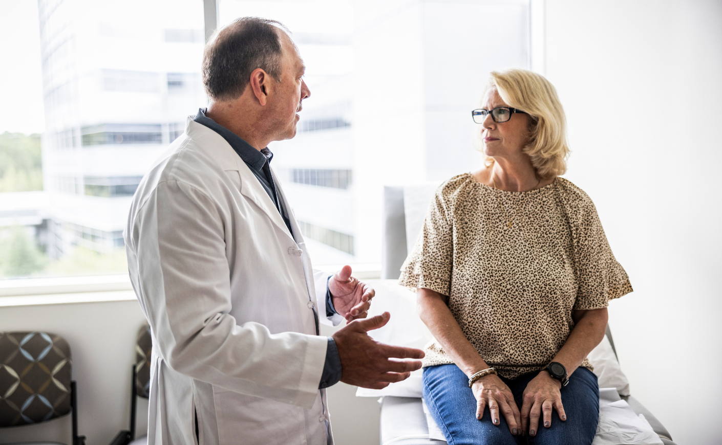 doctor talking to patient