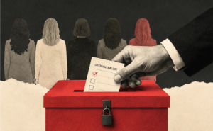 a man's hand voting with women in background
