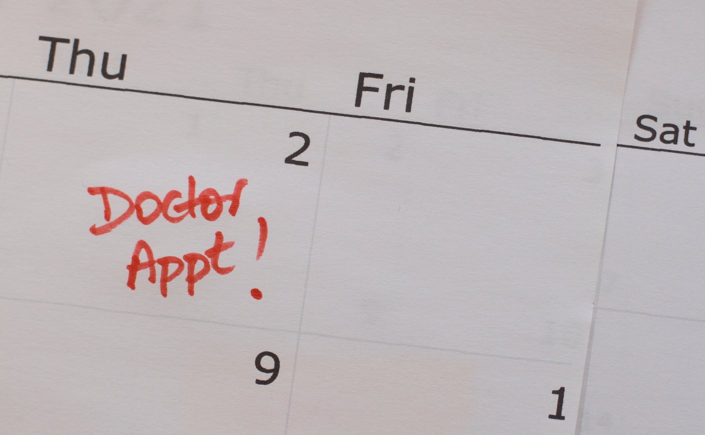 Close-up Of Doctor Appointment Sign On Calendar