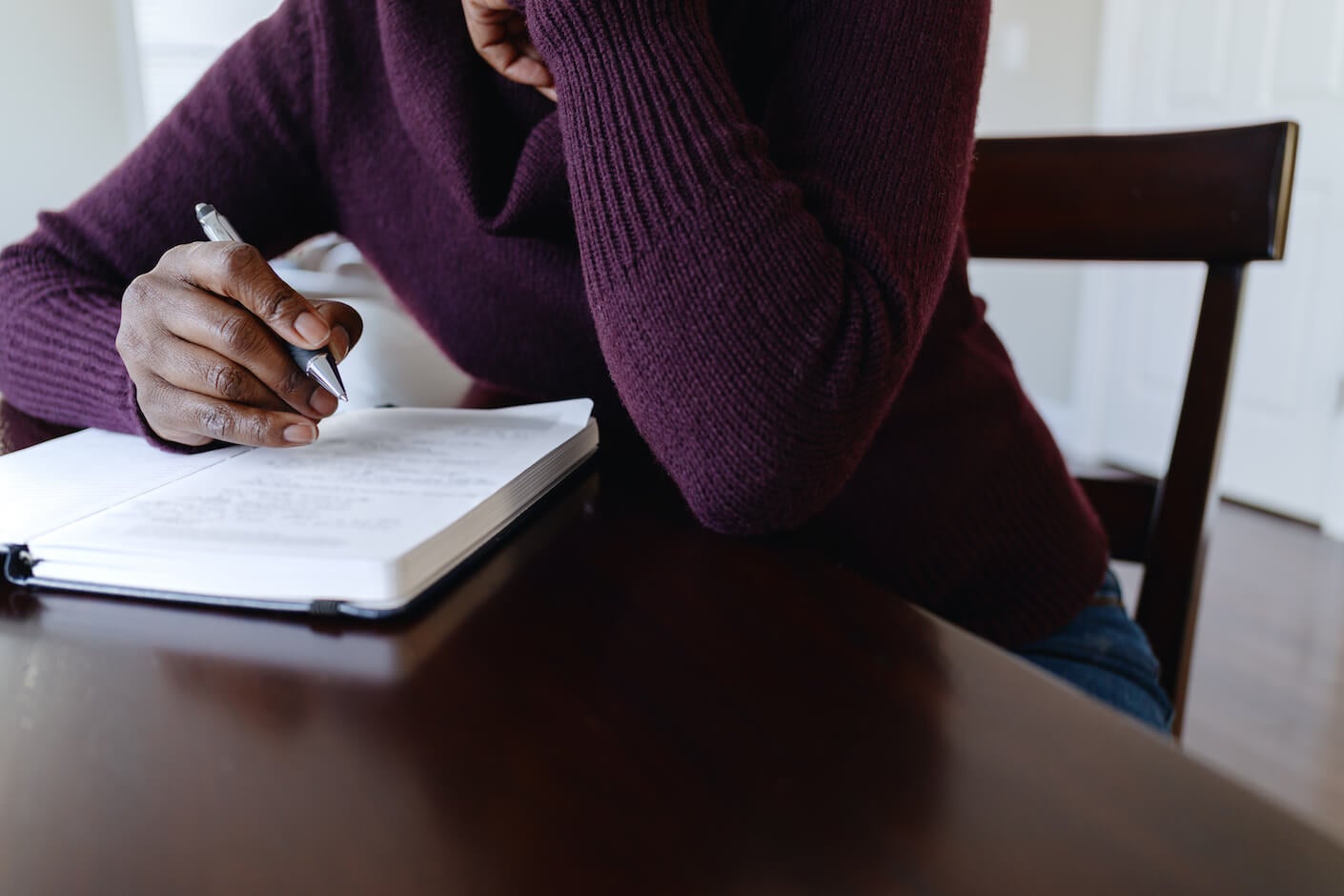 A woman writing.