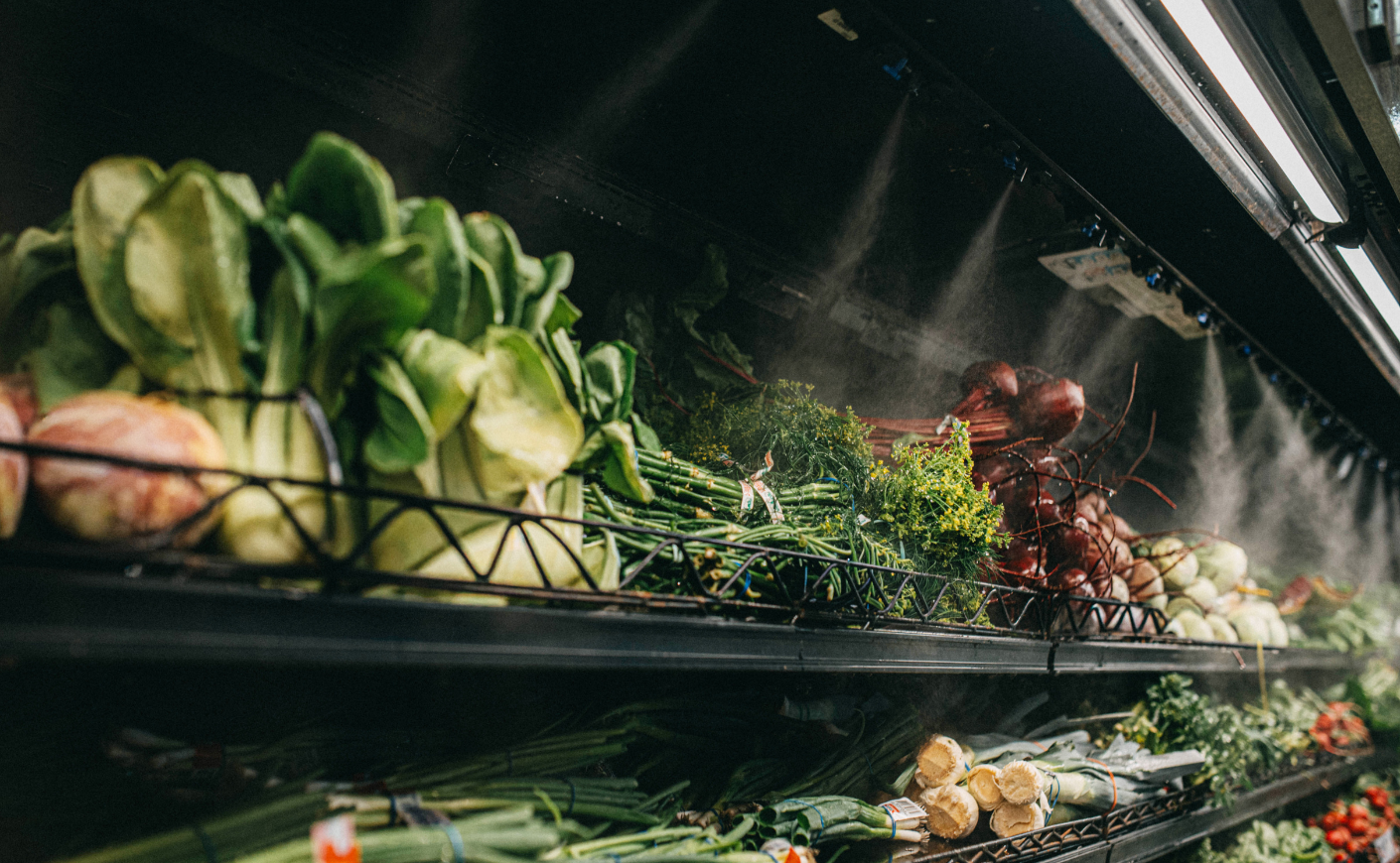 Produce under misters in a grocery store