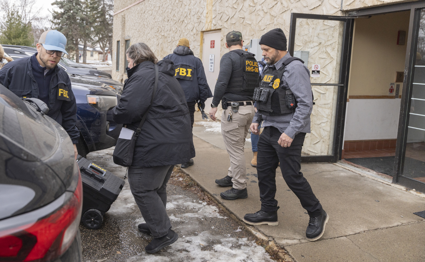 Federal agents execute a search in December 2025 tied to potential Medicaid fraud in Bloomington, Minn.