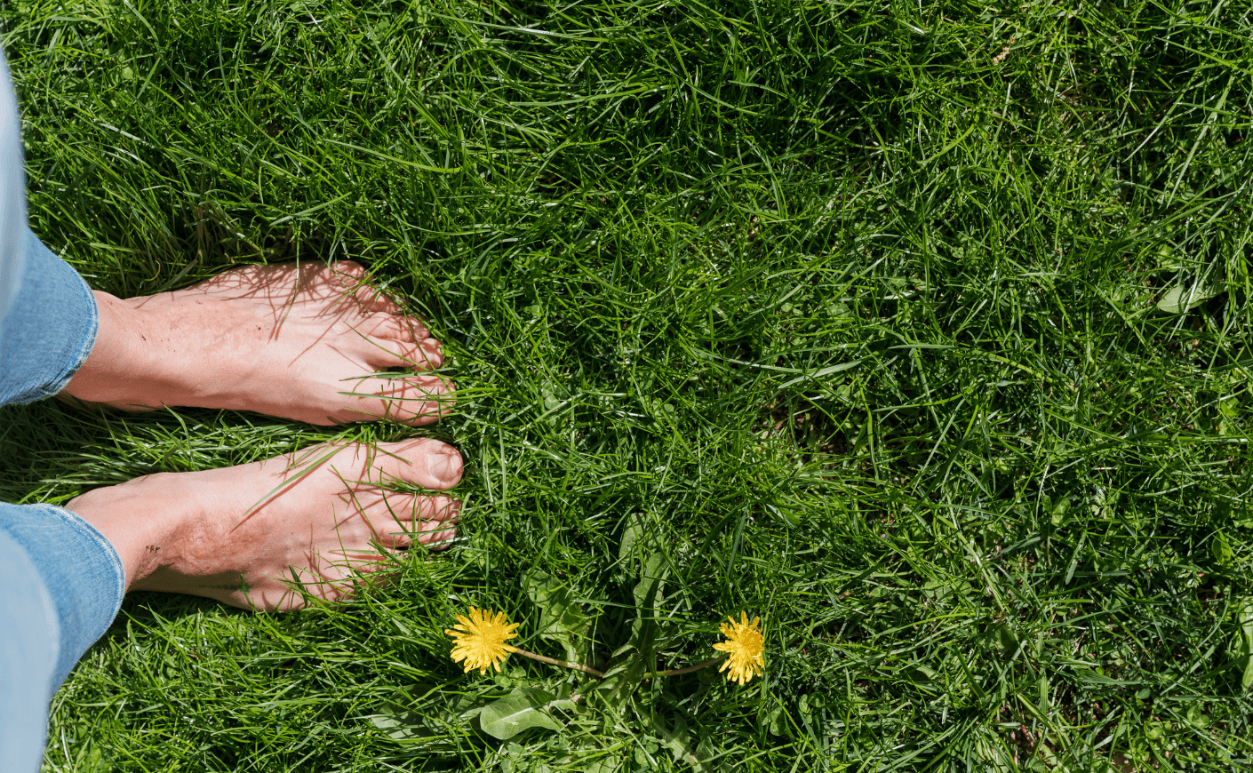 woman barefoot in grass