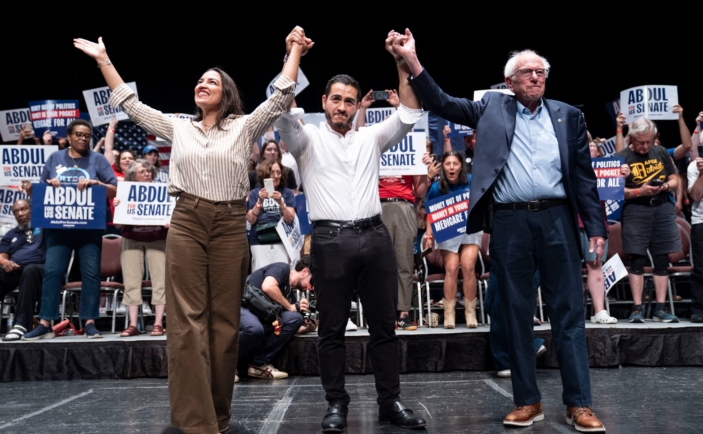 Rep. Alexandria Ocasio-Cortez, Michigan candidate Abdul El-Sayed and U.S. Sen. Bernie Sanders at “The People v. The Powerful” rally at the Detroit Opera House on July 18, 2026