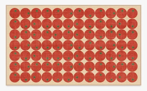 a rug with a tomato pattern.