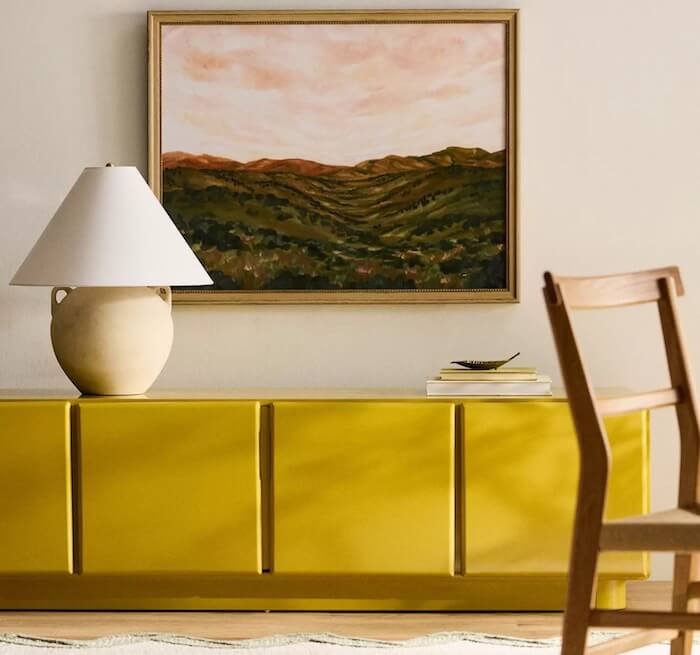 A yellow media console.