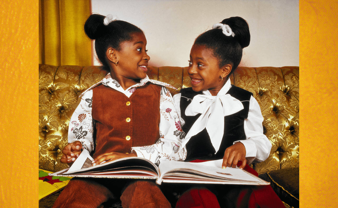 african-american girls reading a book