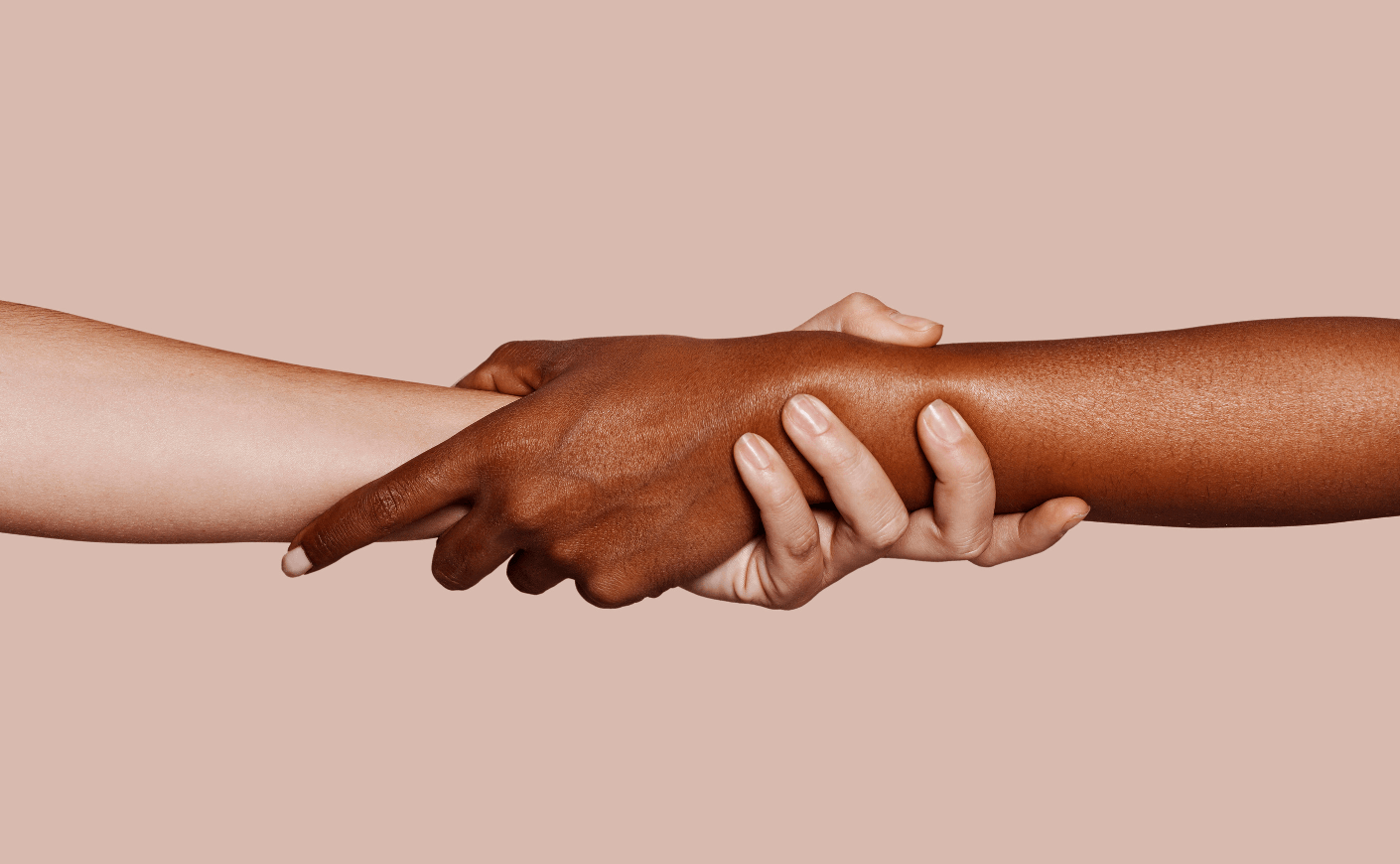 hands shaking, one black and one white