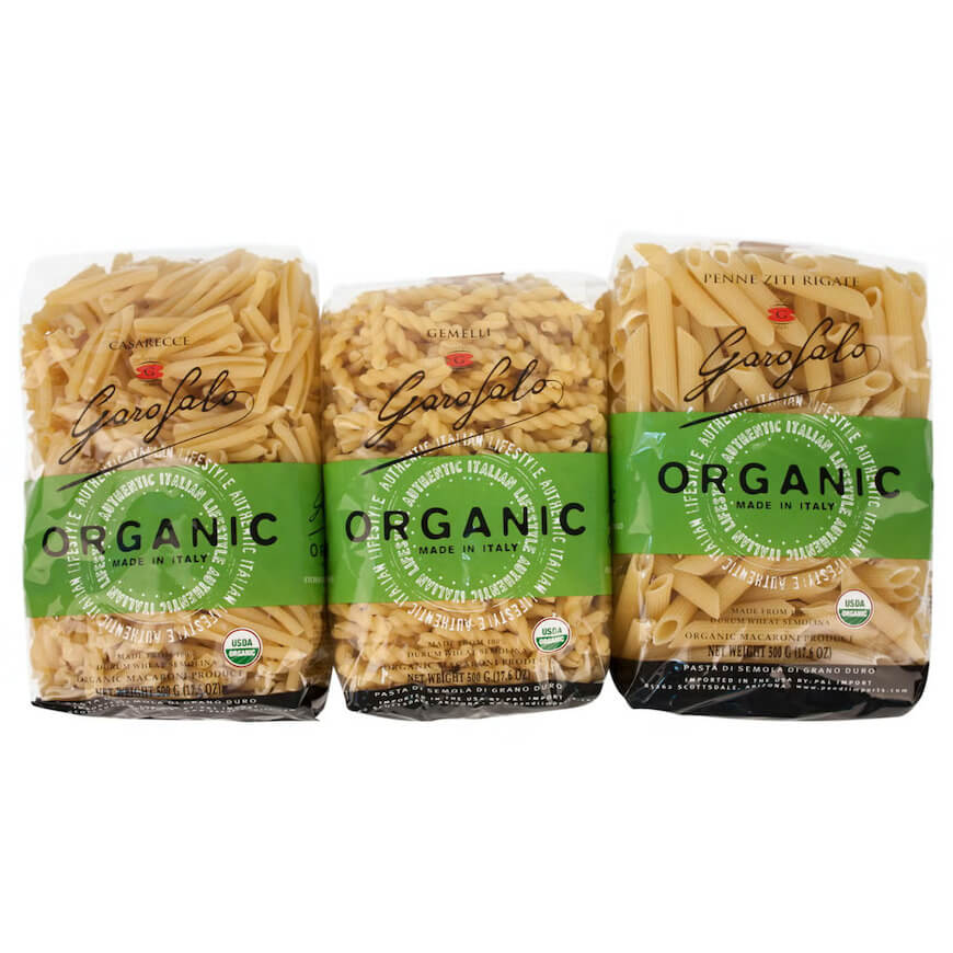 Three bags of assorted dry pasta.