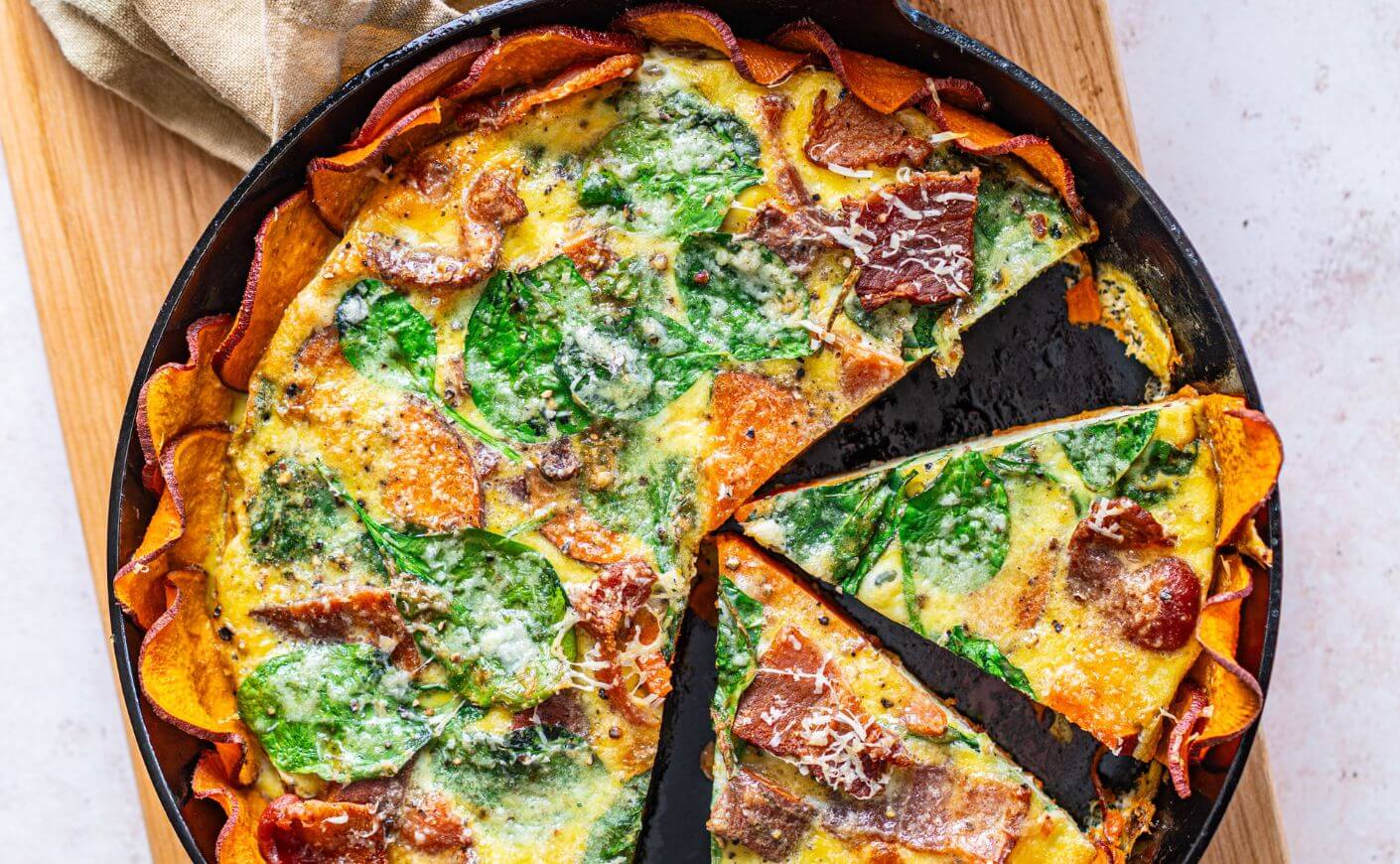 A quiche with a sweet potato crust.