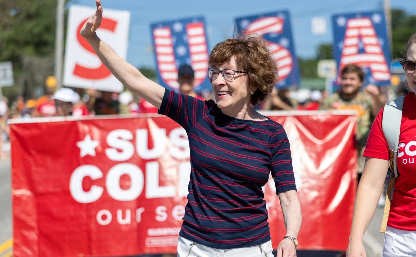 Republican Sen. Susan Collins walks in the annual Moxie Day Parade in July in Lisbon, Maine.