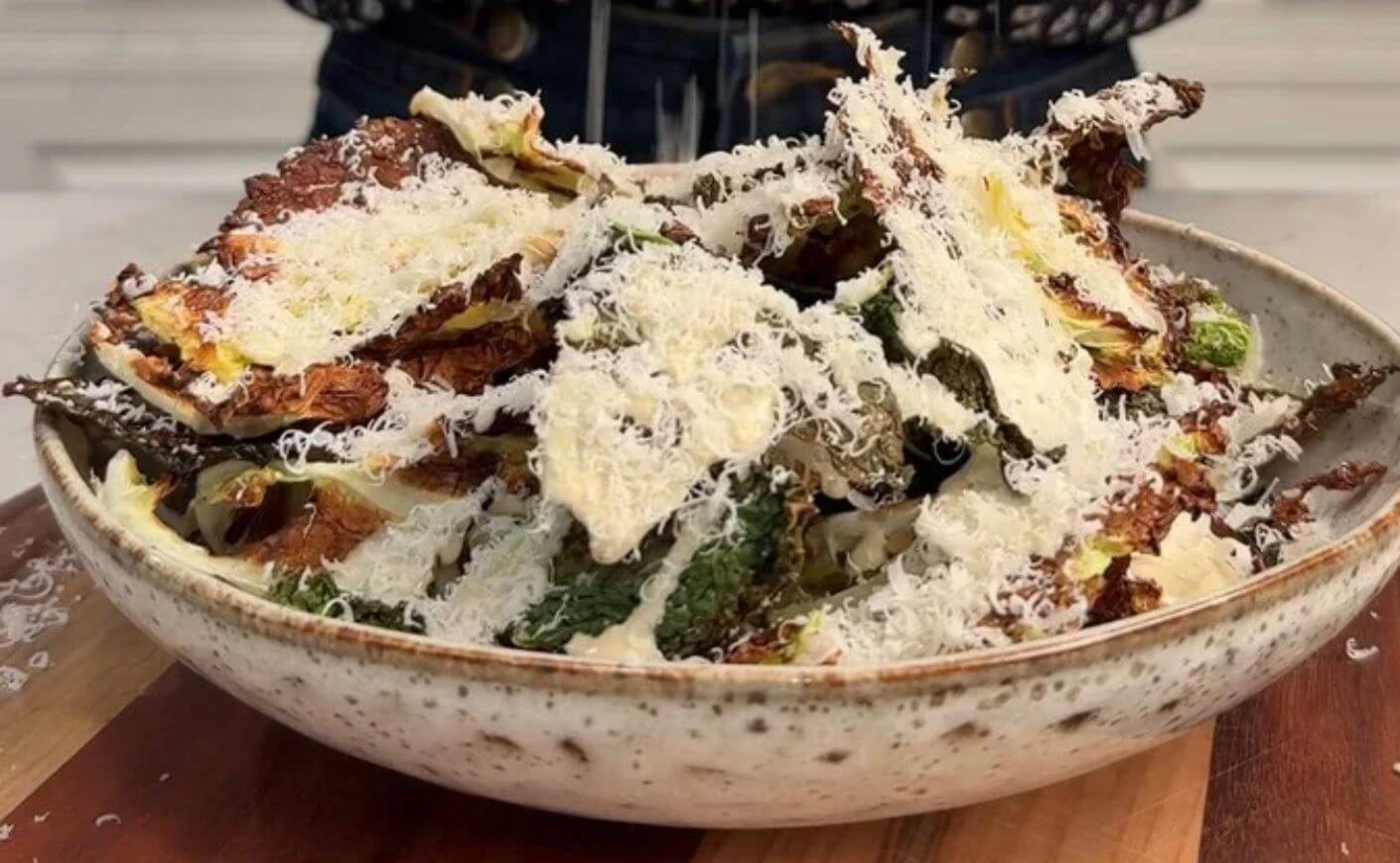 A bowl of cabbage parm chips.