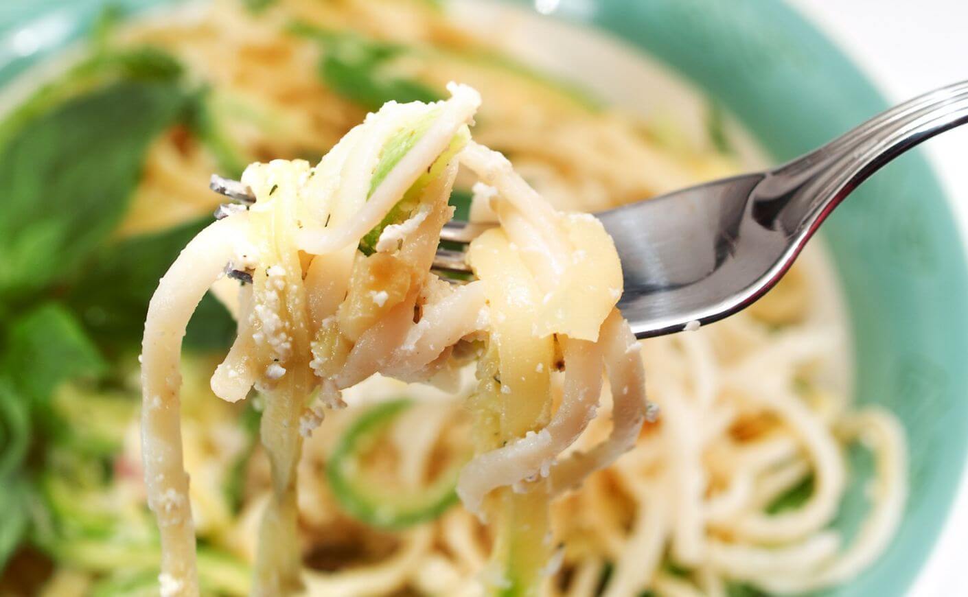A forkful of pasta primavera.