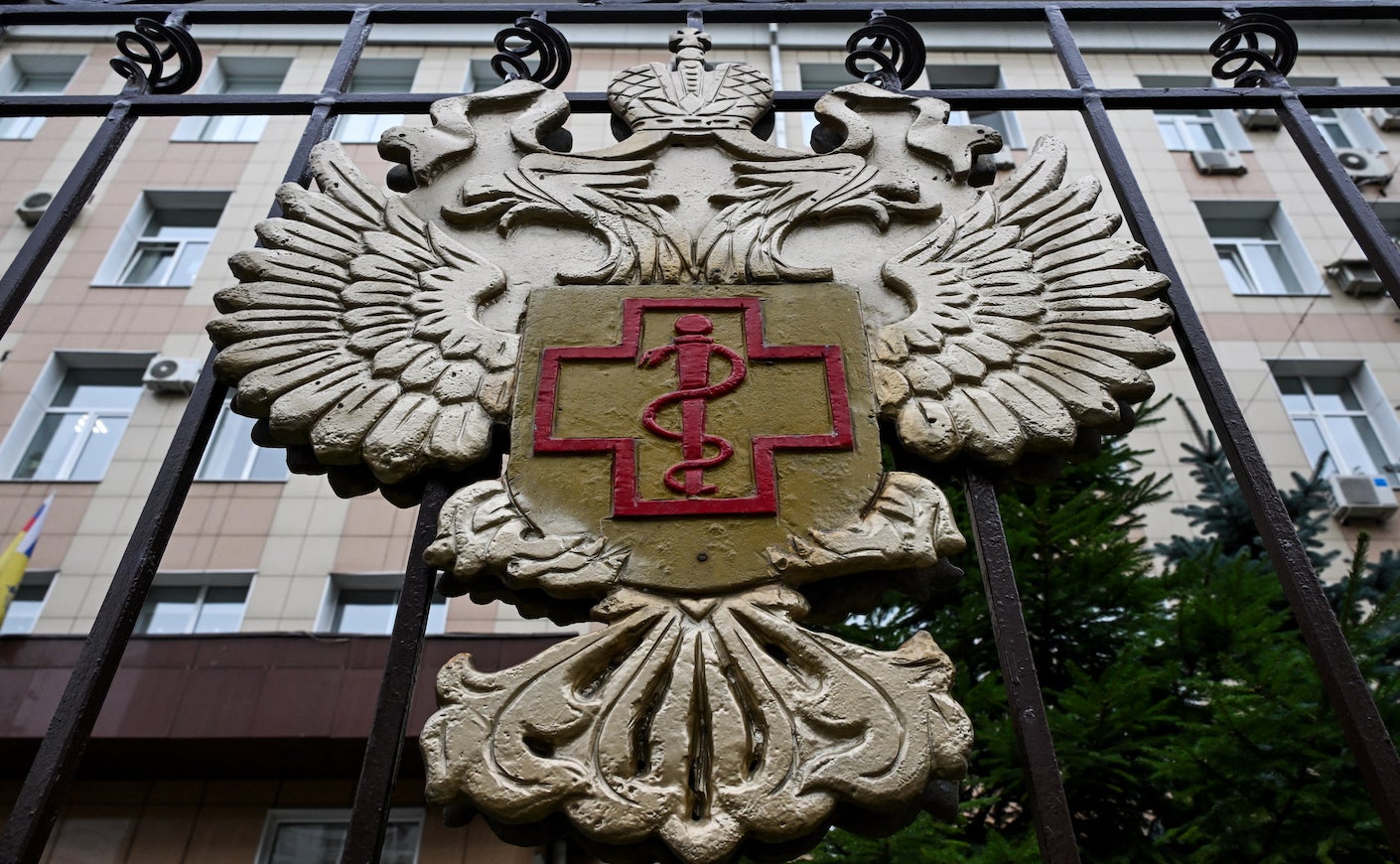 The logo of Russia's consumer and health watchdog Rospotrebnadzor sits on its grounds' fencing in Moscow